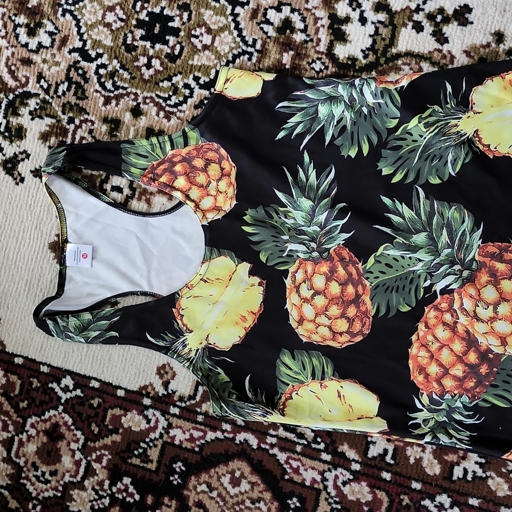 Fun pineapple tank top Med.